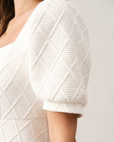 The Solid Textured Puff Sleeve Mini Dress - Threadford