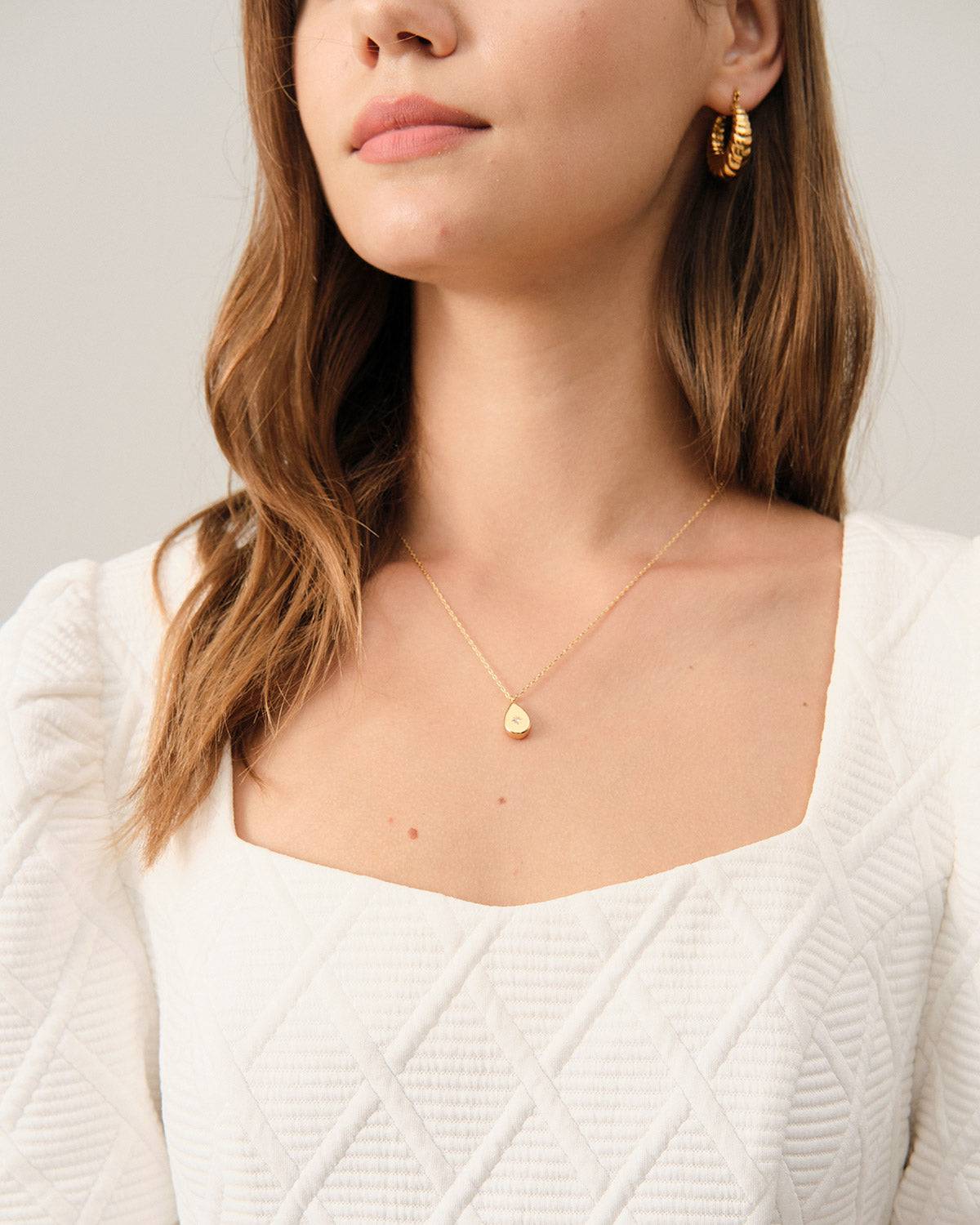 The Solid Textured Puff Sleeve Mini Dress - Threadford