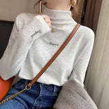 Amelie | Oversized Turtleneck Sweater with Embroidered Details