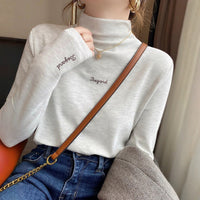 Amelie | Oversized Turtleneck Sweater with Embroidered Details