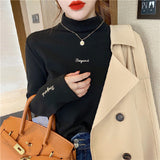 Amelie | Oversized Turtleneck Sweater with Embroidered Details