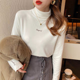 Amelie | Oversized Turtleneck Sweater with Embroidered Details