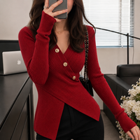 Cardigan con maniche ondulate e chiusura girevole 