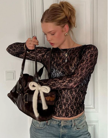 Top a maniche lunghe in pizzo floreale 