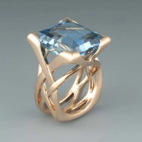 Anello retrò in oro rosa con zirconi blu