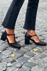 Black solid high heel with T-strap and buckle, round toe - Threadford