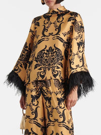 Haut ample à imprimé ethnique en satin avec poignets en plumes