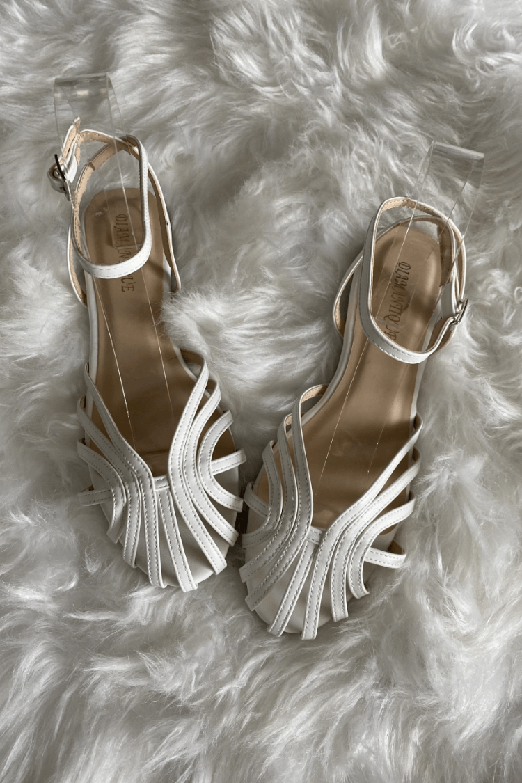 SOLE | Elegant flat woven sandals for a sophisticated look - Threadford