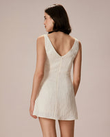 The Beige Boat Neck Textured Mini Dress - Threadford