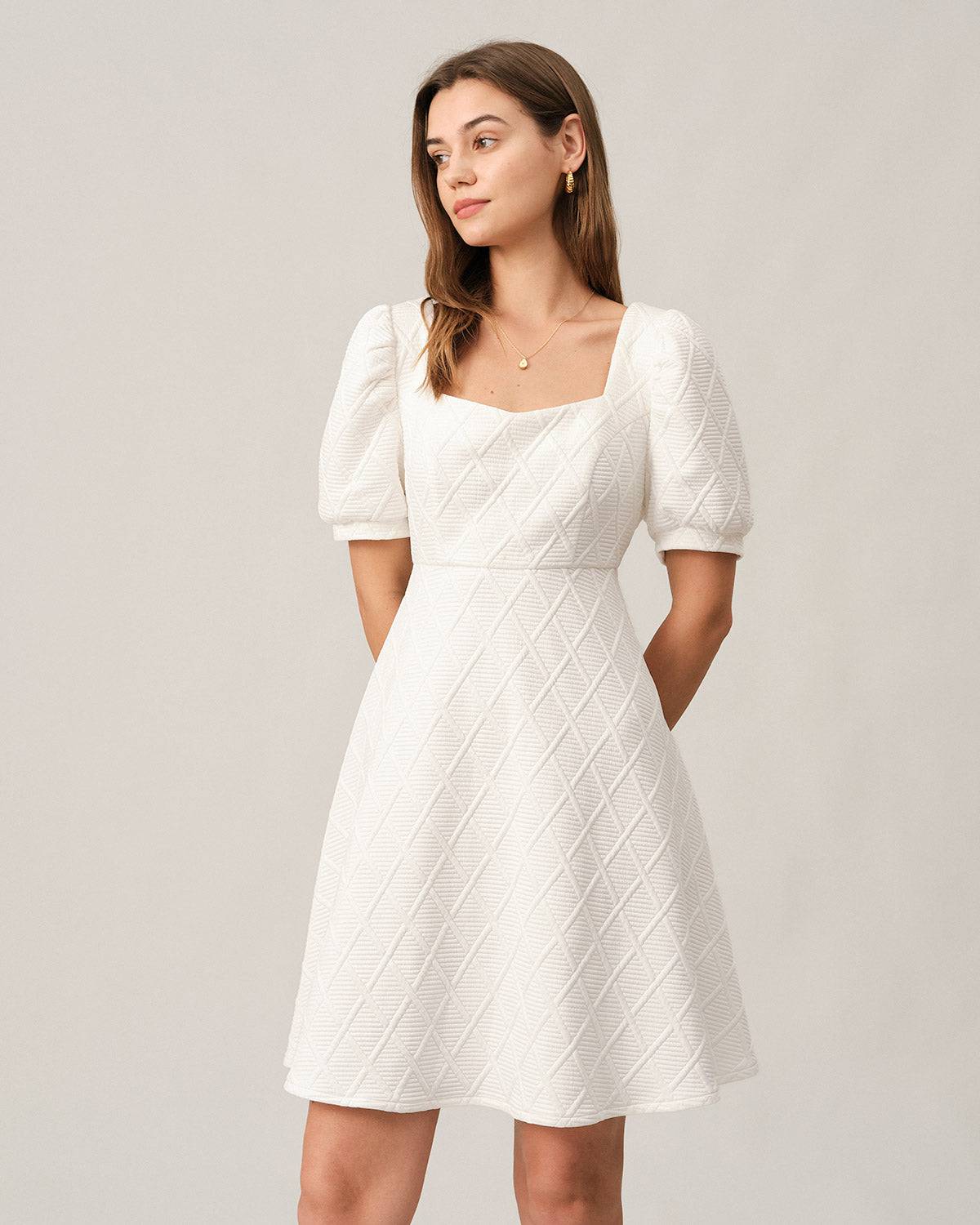 The Solid Textured Puff Sleeve Mini Dress - Threadford